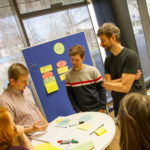 Group at the goals table